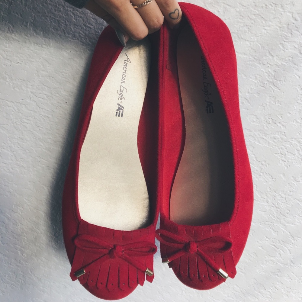 red ballet flats with gold plating